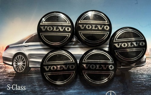 Five genuine volvo wheel caps - five,