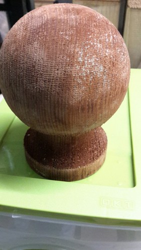 Brown treated wooden ball - treated,