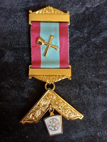 Mark past master - master's, breast
