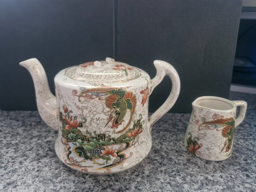 Phoenix ware teapot - ware, milk