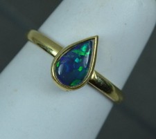 18 Carat Gold and Natural Black Opal Solitaire Ring