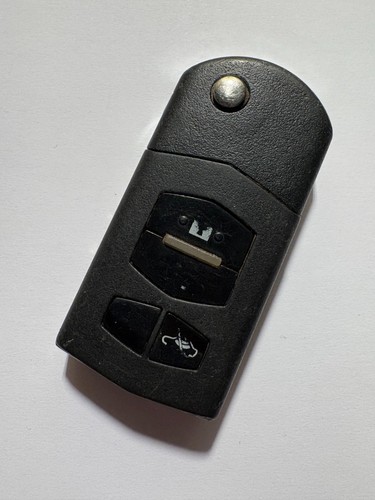 Genuine mazda button remote - mazda,
