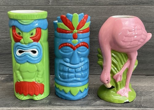 Three ceramic tiki mugs - three,