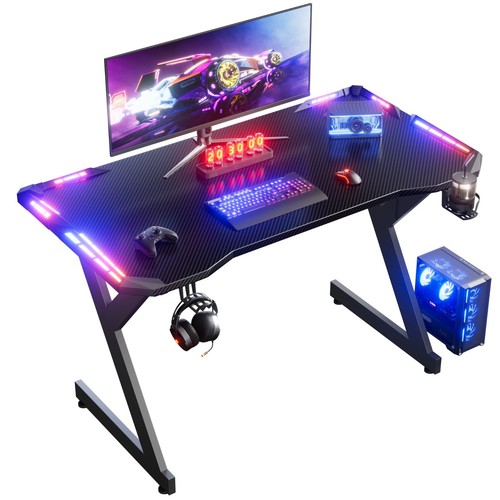 Shaped gaming desk with - with, led
