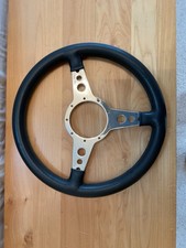 Moto Lita Leather Rimmed 14 Inch Flat Steering Wheel.