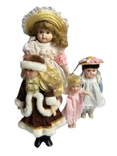 Bundle of 4 Porcelain Dolls Various Sizes