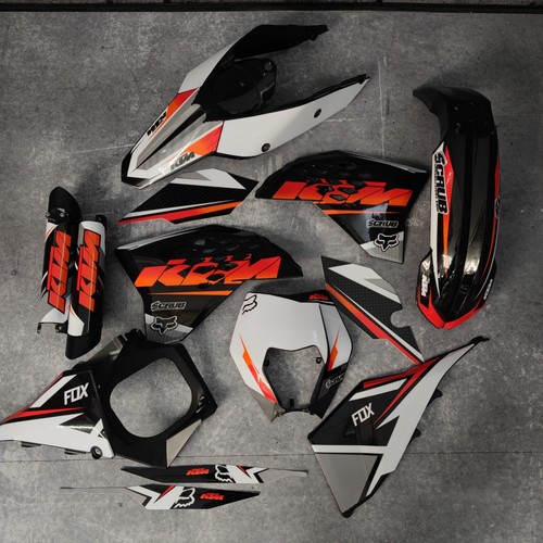 Plastics graphics applied - +,