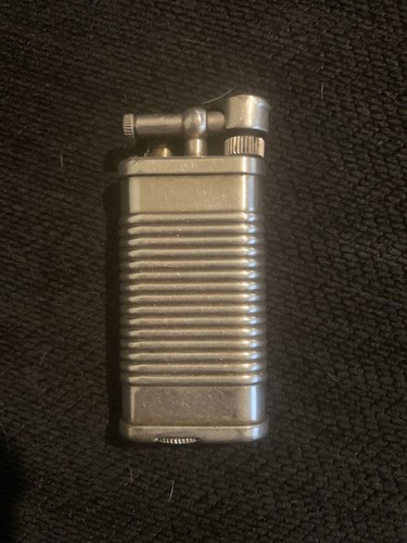 Dunhill unique tin - -can, design