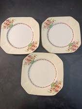 Set of 3 Brittania Pottery Co. Octagonal plates w/ tulips Scotch Ivory G.B.