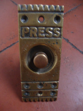 Antique brass door bell press