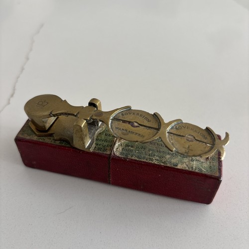 Antique brass sovereign coin - brass,