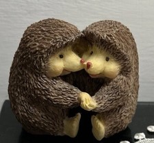 Cuddling Hedgehog Couple in