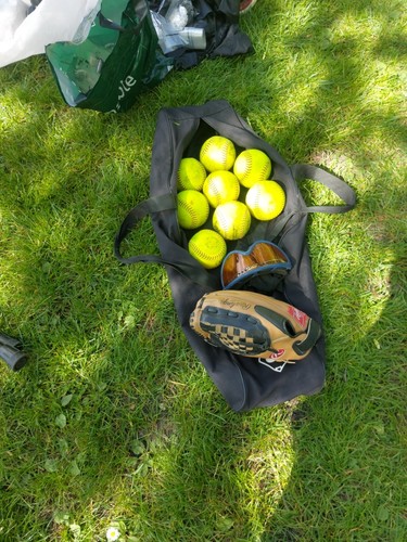 Softball equipment including - softball,
