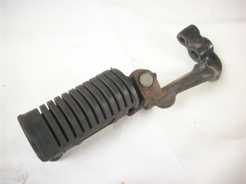 Footrest bracket front - +,