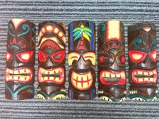 Tiki mask wood carving Hand