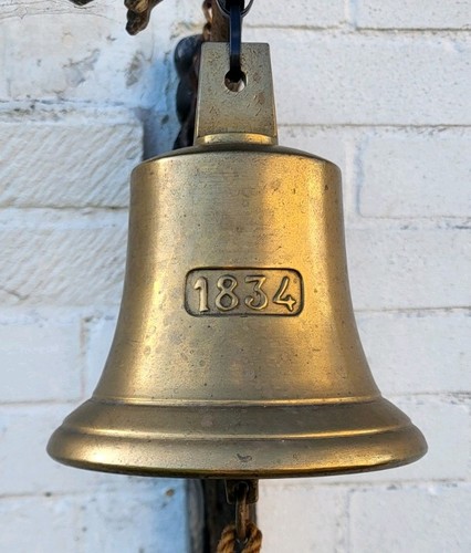 Bronze ship bell featuring - bell,