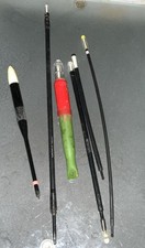 A GROUP OF OLD NIGHT FISHING FLOATS.