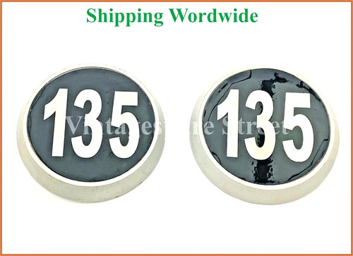 Pair plastic bonnet badge - of,