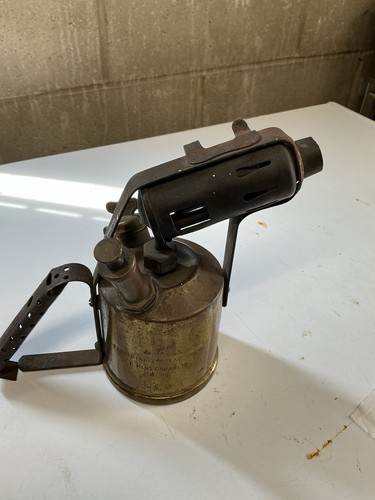 Antique blow torch lamp runs - blow,