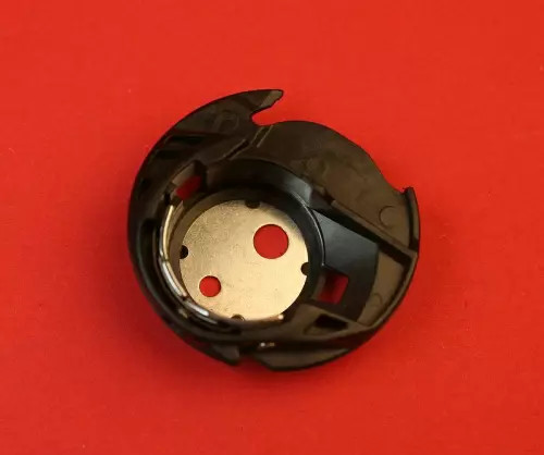Bobbin case capsule for - capsule,
