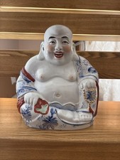 Porcelain statue of the Laughing Buddha