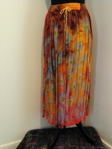Long rainbow coloured peacock