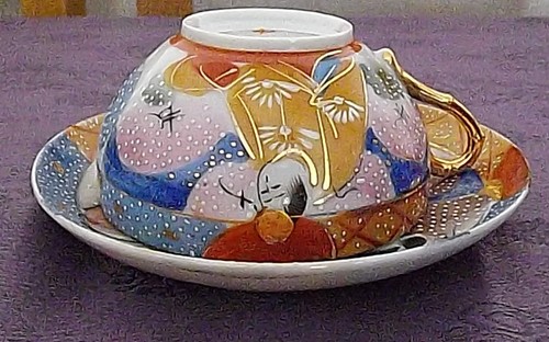 Cup and saucer patterned - and,