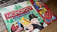 Monopoly electronic banking family board game