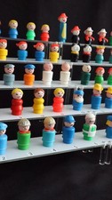 Various Fisher Price dolls