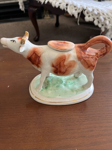 Staffordshire pottery cow - pottery,