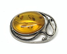 Art nouveau sterling silver and amber brooch