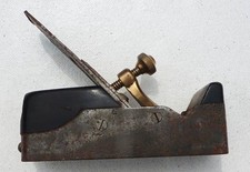 AN OLD EBONY, BRASS AND STEEL INFIL PLANE BY SLATER OF LONDON
