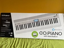 61 key Roland Piano, Alexa, Stool & Stand -boxed.