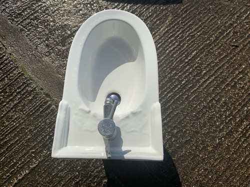 Bidet and handwash basin - and,