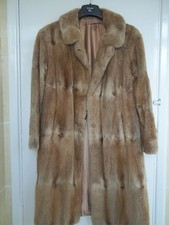 Woman's musquash fur coat