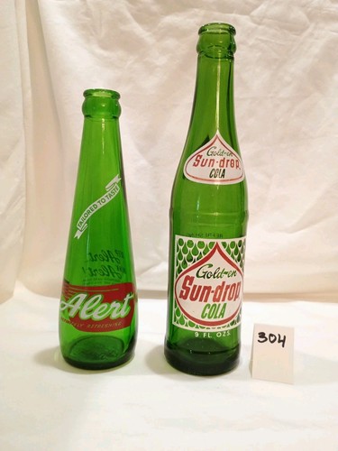 Vintage green glass bottles - green,