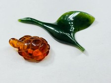 Amber turtle and jade/nephrite carvings