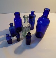 8 Antique Poison Bottles Blue