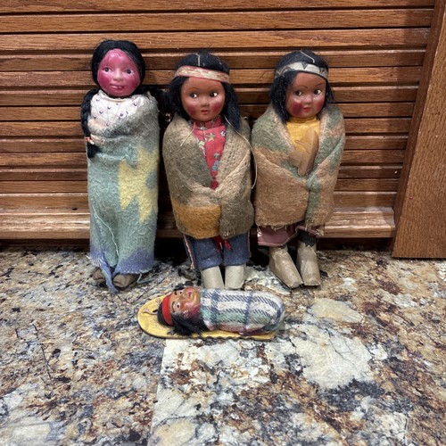 Lot four vintage skookum - lot,
