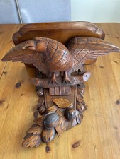 Large Antique carved oak clock bracket in the form of a bird