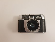 Halina Paulette electric 35mm camera , leather case ,spares/repairs as untested.