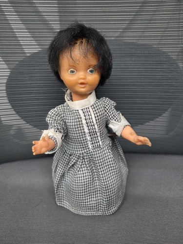 Vintage clockwork walking doll