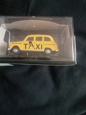 Oxford Diecast FX4 Taxi Yellow Pages