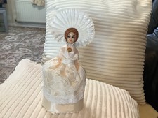 vintage doll dressed like