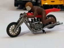 VINTAGE MATTEL HOT  WHEELS  RRRUMBLERS RED HIGH TAILER WITH BROWN  RIDER