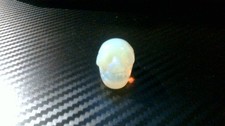 opalite crystal skull carving