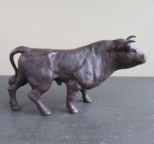 Cast Metal Sculpture of a Bull