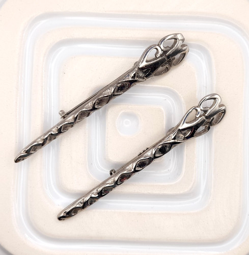 Two scottish kilt - two, pins