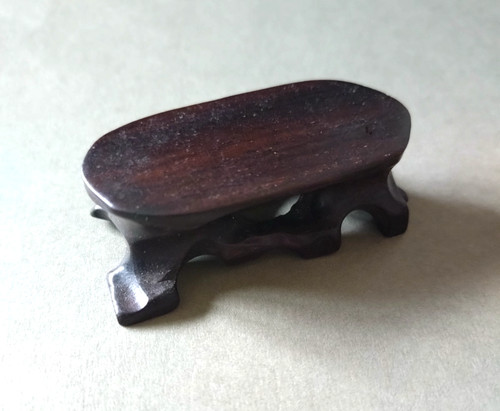 Carved ironwood single tier - ironwood,