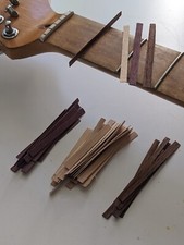 Veneer fret slot fillers for